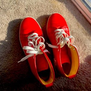 two pair of Christian Louboutin Louis sneakers